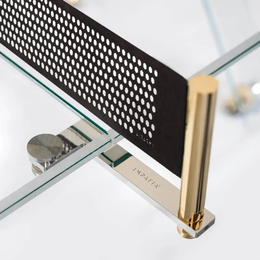 Superior Impatia Lungolinea table tennis table with transparent glass and golden-toned metal legs in satin finish