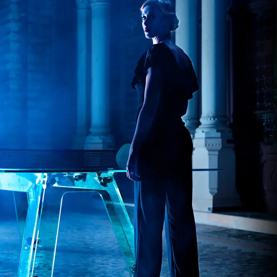 Exclusive Impatia Lungolinea Classic/Gold table tennis table with dark grey playing surface and transparent glossy frame crafted in glass and synthetic materials