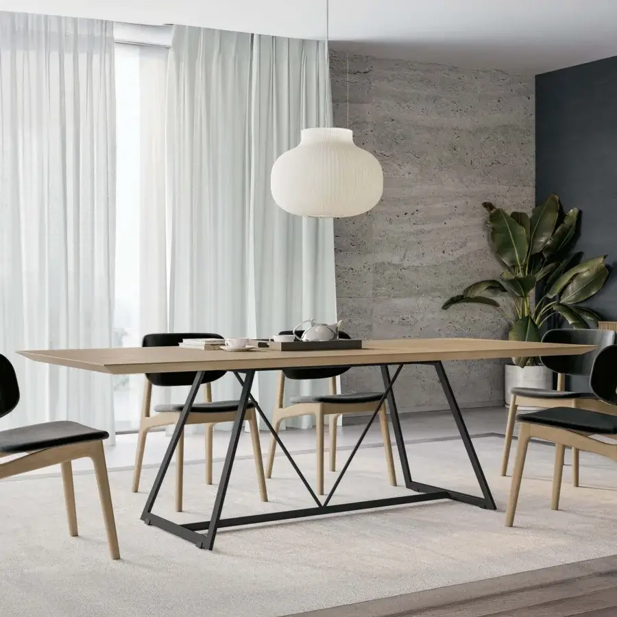 Distinguished Dallagnese Radar table with a light-toned wood tabletop and matte black metal frame exhibiting a satin finish
