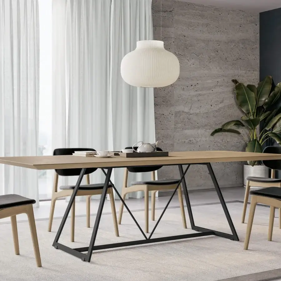 Exceptional Dallagnese Radar table with a warm medium-toned wood tabletop and dark gray metal frame built with central tie rods