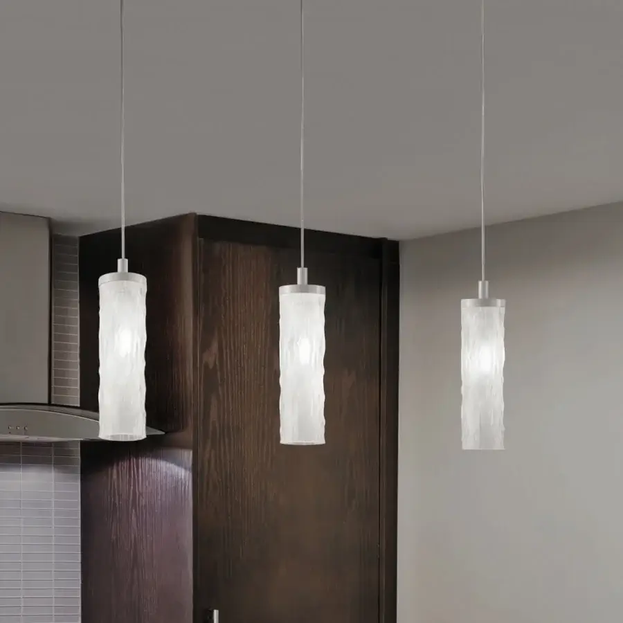 Distinctive Euroluce Iceberg S1 suspension lamp crafted in Ice White cylindrical glass with a “cortex” texture