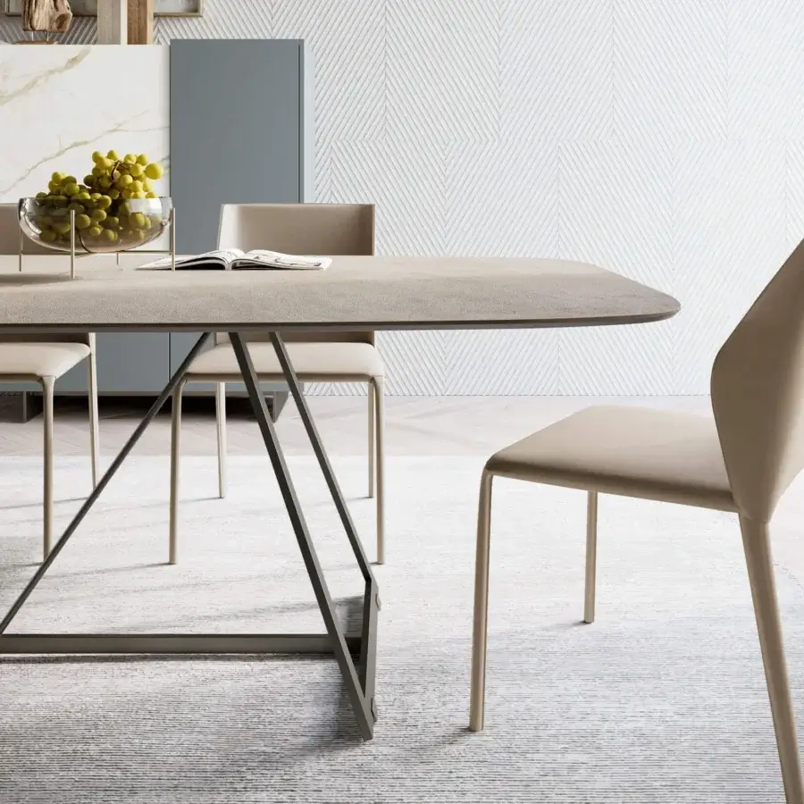 Elegant Dallagnese Radar table with a matte warm grey tabletop and darker grey metal inverted V-shaped legs