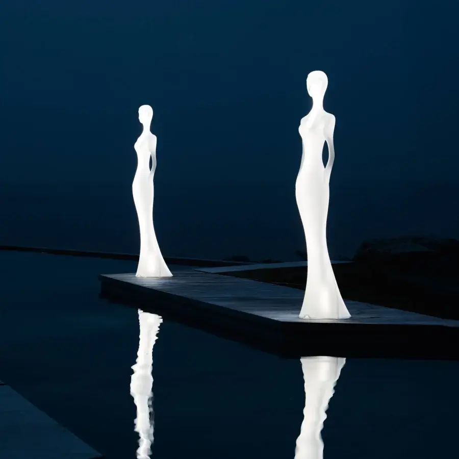 Distinguished MY YOUR Penelope floor lamp inspired by classical Greek forms with organically curved silhouette and smooth matte white finish
