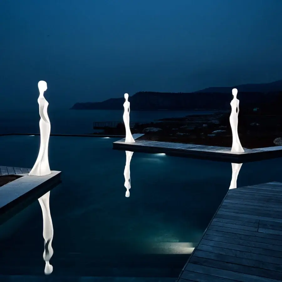 Avant-garde MY YOUR Penelope floor lamp inspired by classical sculpture with a smooth matte white finish and oxidized detailing