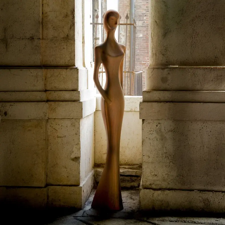 Superior MY YOUR Penelope floor lamp crafted in Italy with a gently curved silhouette and evocative oxidized wood finish