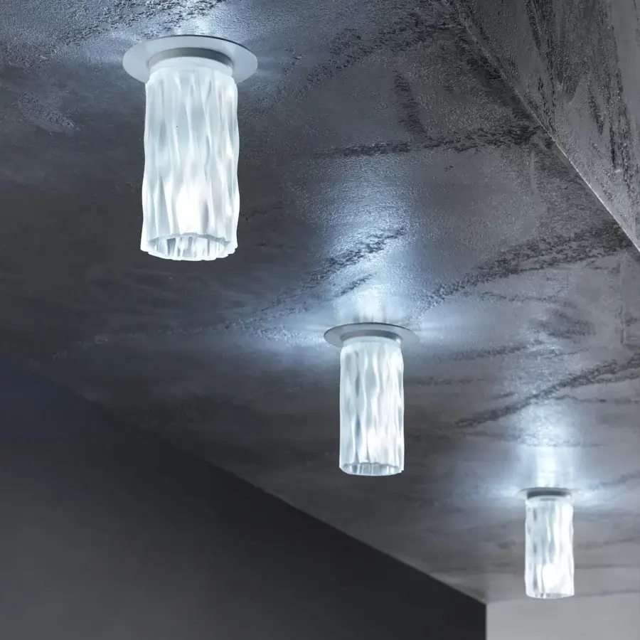 Superior Euroluce Iceberg spotlight set with handcrafted glass diffuser finished with the exclusive “cortex” technique and sleek Ice White metal base