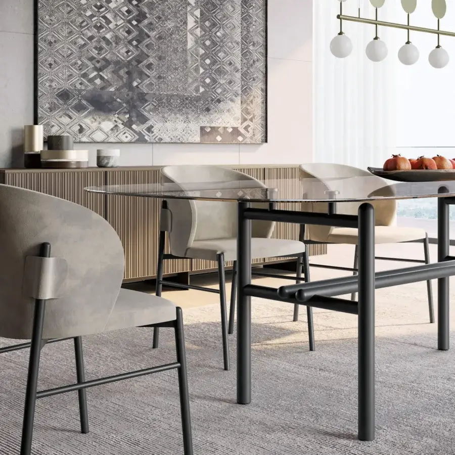 Distinctive Dallagnese Supernova table with convex glass top and dark-toned stone border built with matte black metal tubes