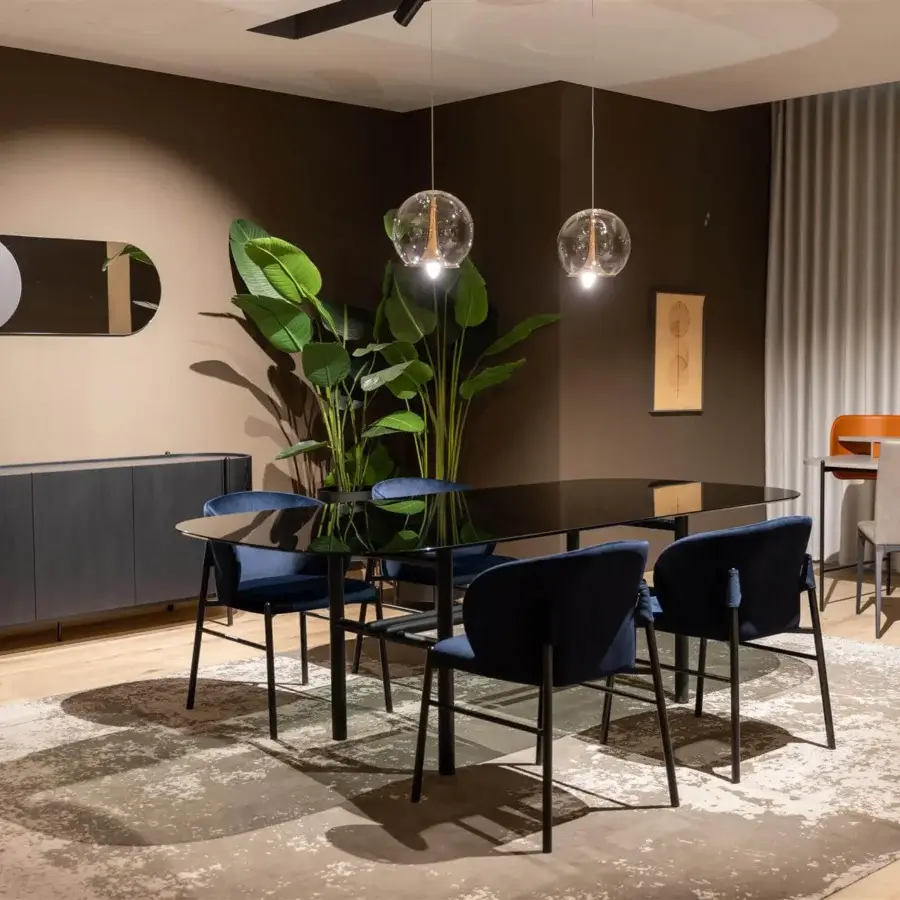 Elegant Dallagnese Supernova table with dark transparent glass top and slender matte black metal frame