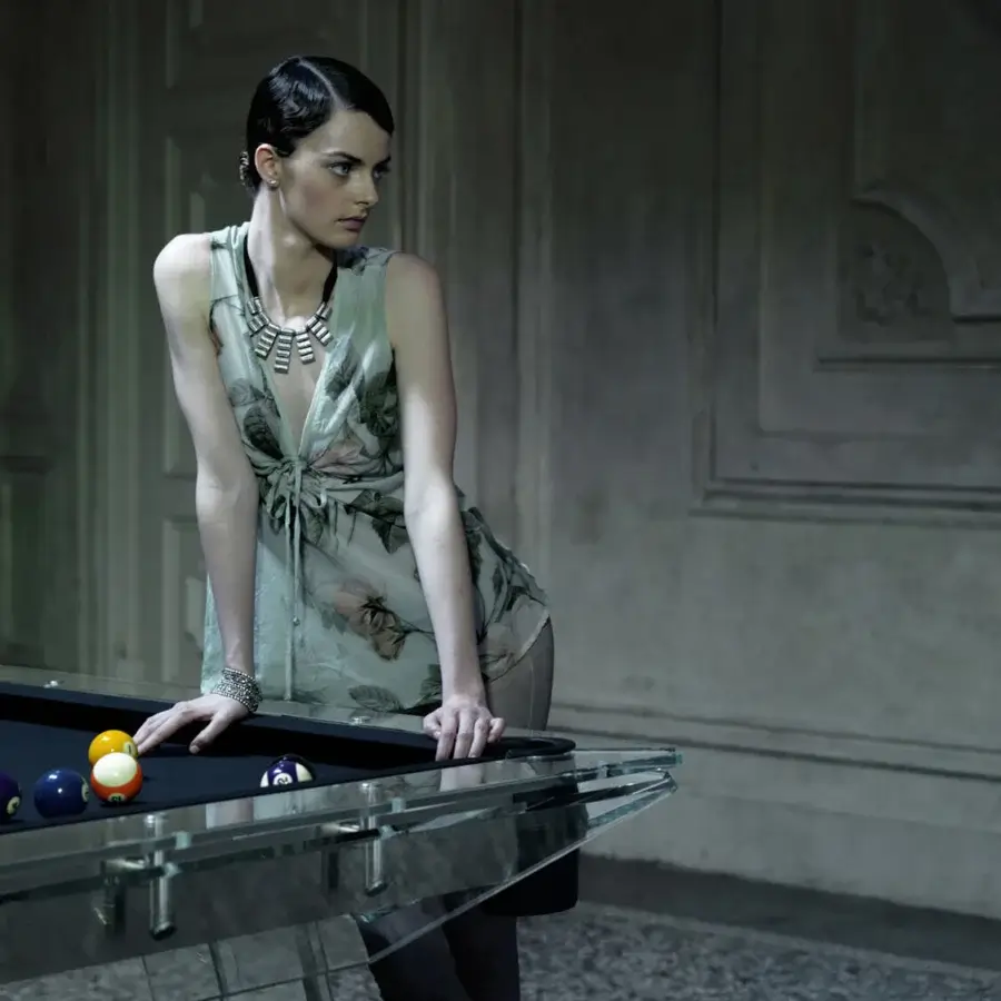 Distinguished Impatia Filotto pool table built with Italian slate, clear glass, dark wood, chrome joints and Simonis cloth finish