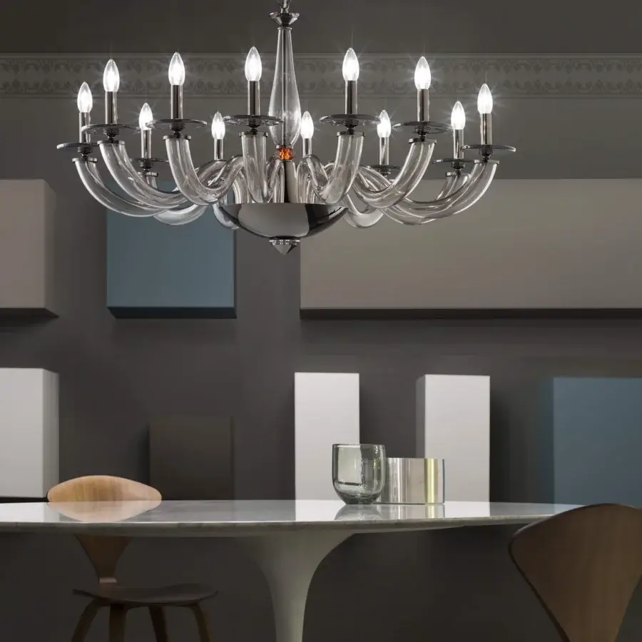 Distinguished Euroluce Olympia chandelier crafted in Italy with black nickel finish, warm brown hue and viridian crystal sphere