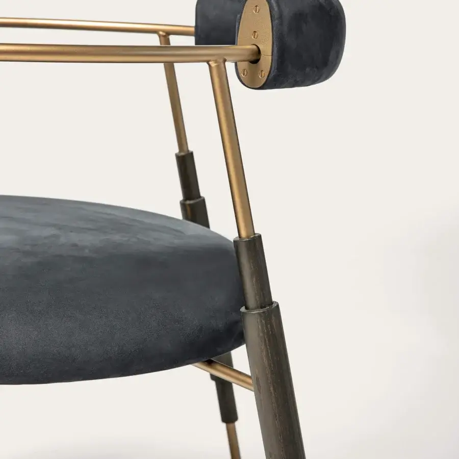 Superior Shake Frame armchair with charcoal frame, dark textile upholstery and varnished steel built with refined solid ash wood legs