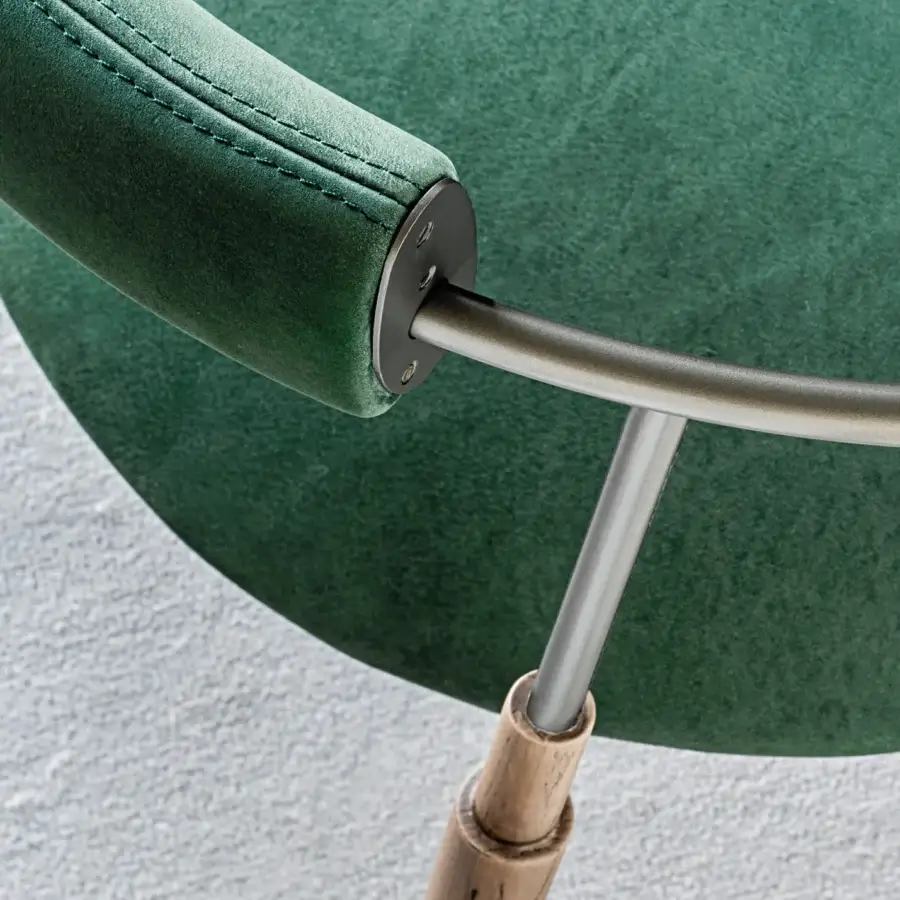 Lavish Shake Frame armchair with varnished steel structure, refined solid ash wood legs and muted green textured fabric upholstery