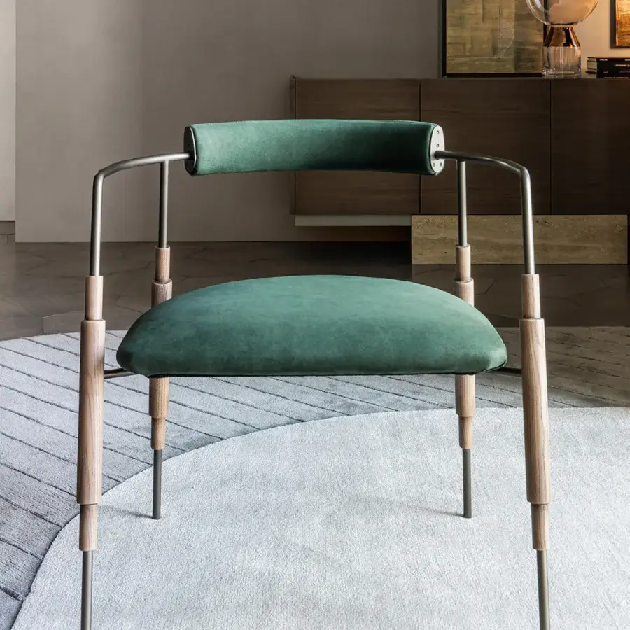Superior Shake Frame armchair with varnished steel, refined solid ash wood, and muted green textile upholstery