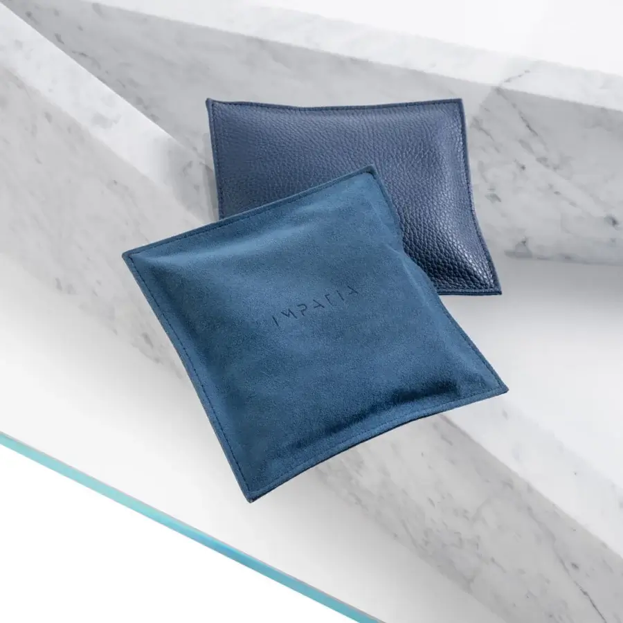 Exceptional Impatia Lancio cornhole with dark blue Alcantara® and leather bags, plus a textured matte blue counterpart subtly embossed with the IMPATIA logo