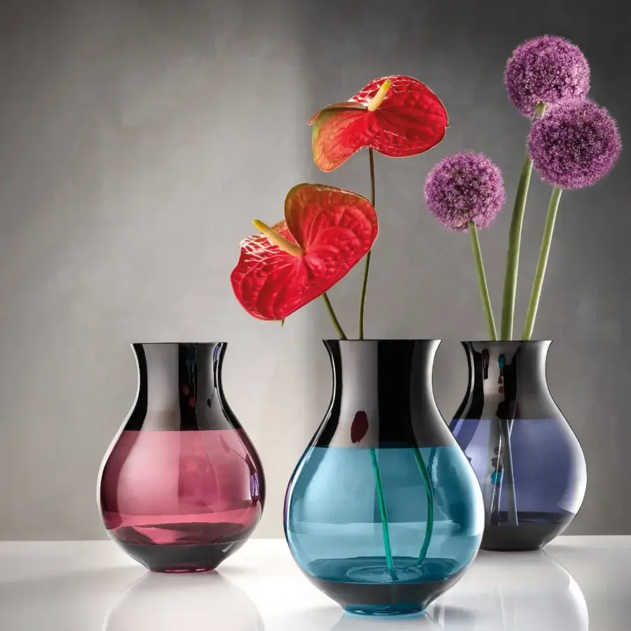 Superior Euroluce Infinity vase crafted in fuchsia glass with a striking black nickel band for contemporary appeal