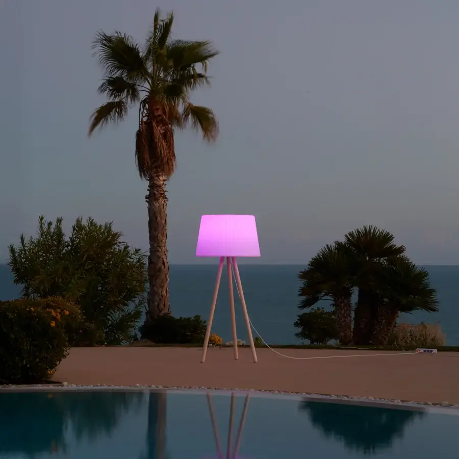Elegant MY YOUR Agata Wood floor lamp with pink translucent Poleasy diffuser and satin-finish wooden tripod base crafted for outdoor use