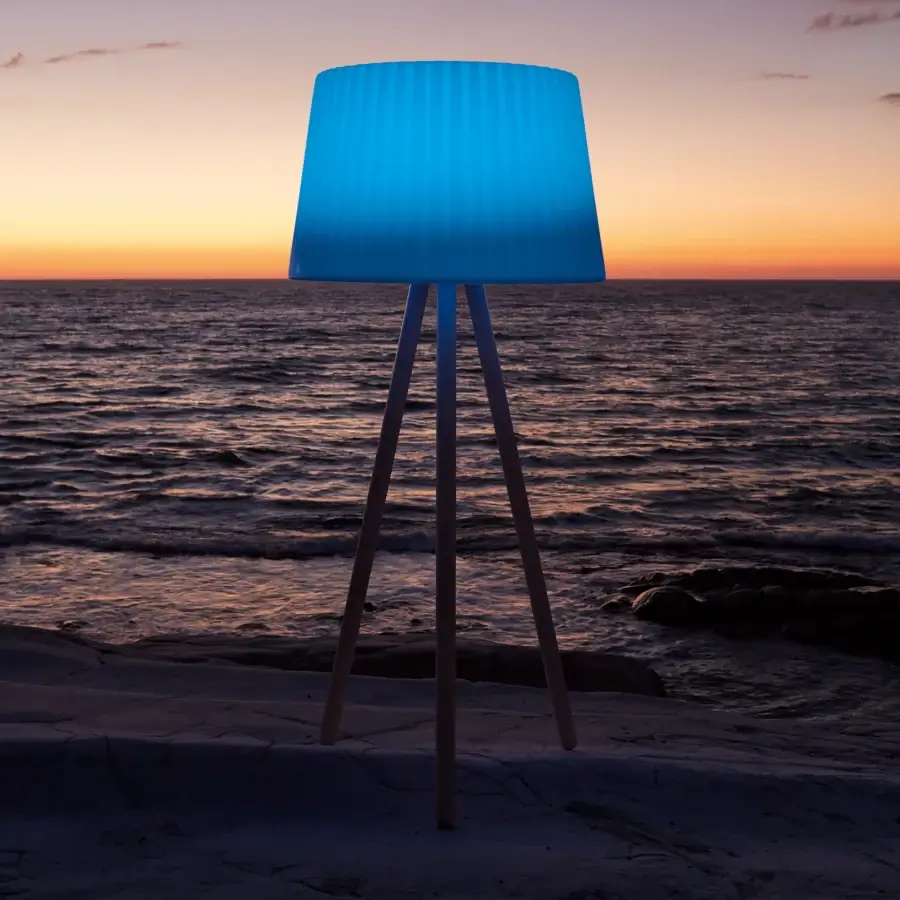 Elegant MY YOUR Agata Wood floor lamp with vibrant blue lampshade and light-toned wooden tripod base crafted for outdoor use