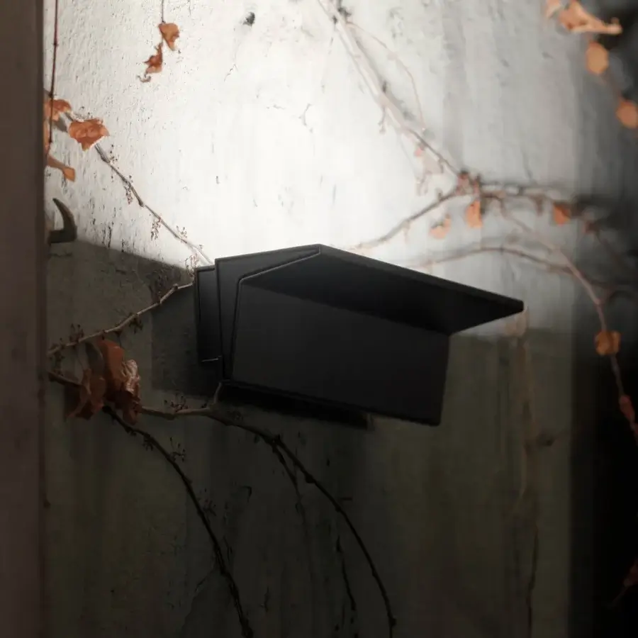 Exclusive Nemo Lighting Zena wall lamp crafted in recyclable aluminum with matte black finish and geometric form