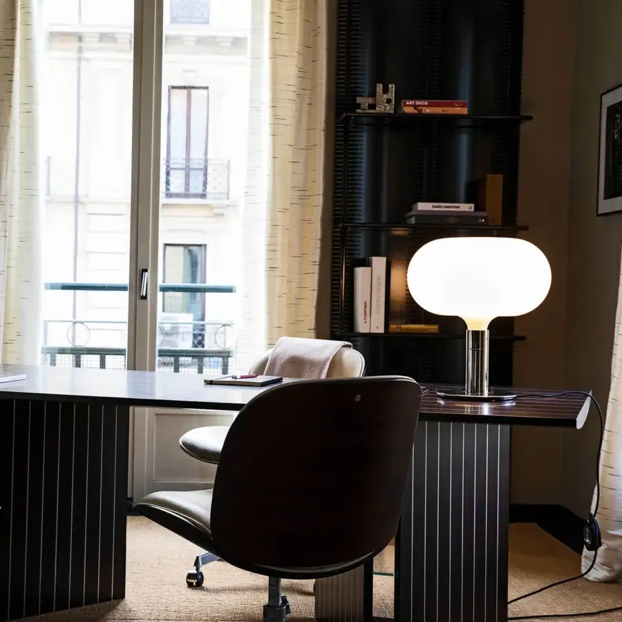 Distinguished Nemo AM1N table lamp in white hand-blown glass with a dark gray satin metal base and support