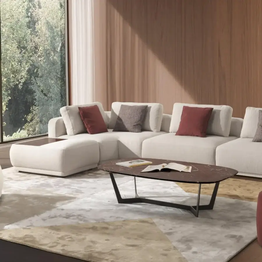 Refined CTS Salotti Navona lounge chair with gently curved fully enveloping form upholstered in textured light beige textile