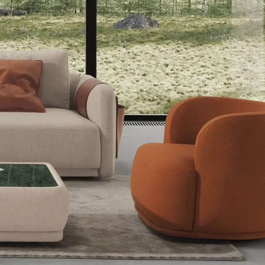 Distinguished CTS Salotti Navona lounge chair with innovative gently curved form in reddish-orange textured textile and matte finish