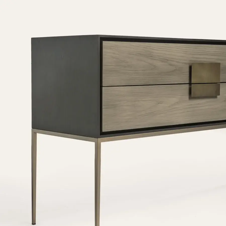 Superior Shake Ego sideboard built with dark gray and medium-toned ash wood, burnished brass handles, and varnished metal legs