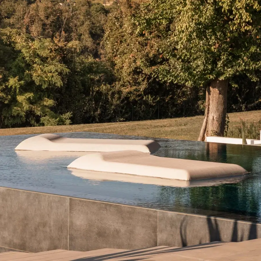 Distinguished MY YOUR Louis floating lounger crafted in Italy with smooth, slightly textured textile surface in a light beige tone