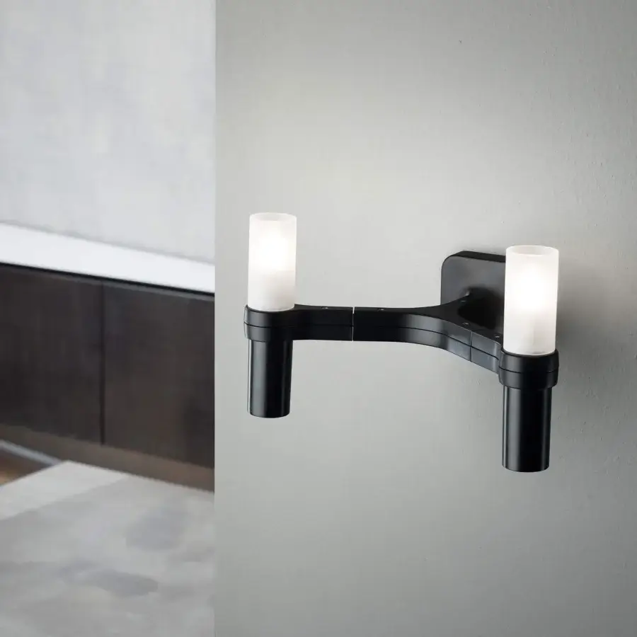 Exceptional Nemo Crown Wall Lamp, a contemporary fixture crafted in dark-toned metal with matte finish and directed cylindrical glass shades