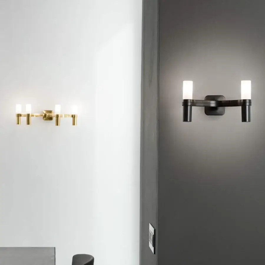 Superior Nemo Crown Wall Lamp, a contemporary fixture built in golden-toned metal with a smooth polished finish