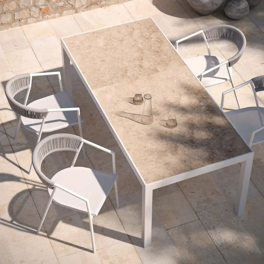Elegant MY YOUR Maja armchair crafted with a matte white powder-coated aluminum frame and light gray synthetic rope weave