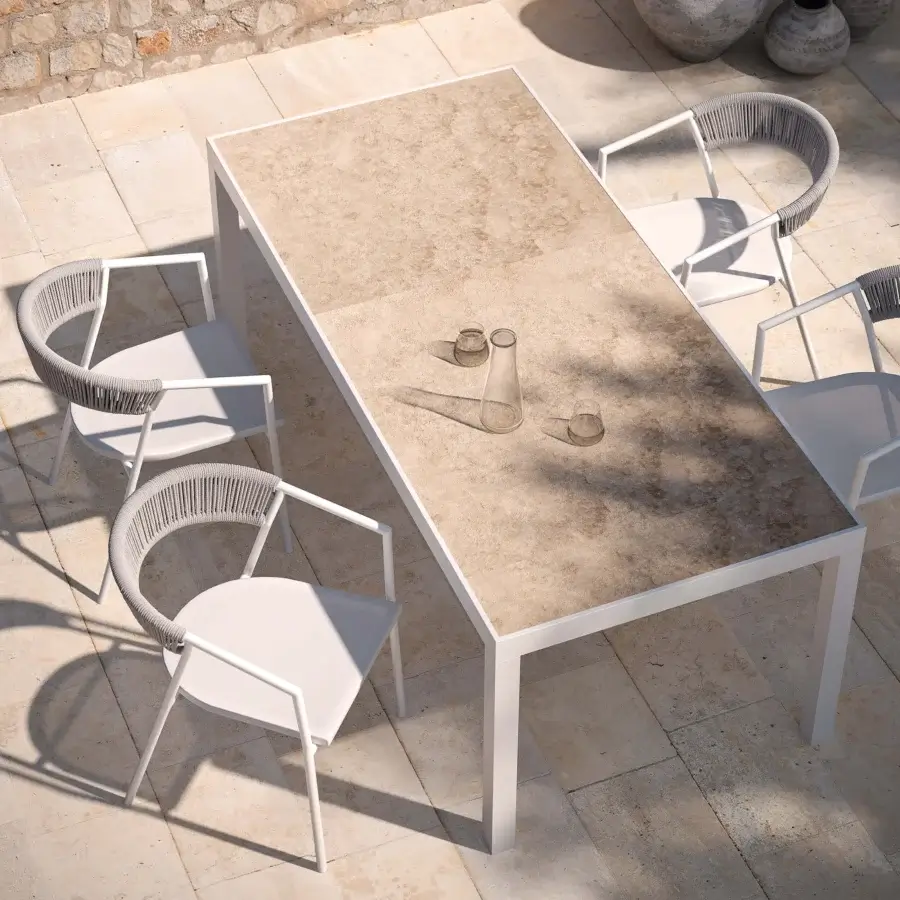 Distinguished MY YOUR Maja table in neutral beige with durable synthetic material exhibiting a smooth matte finish