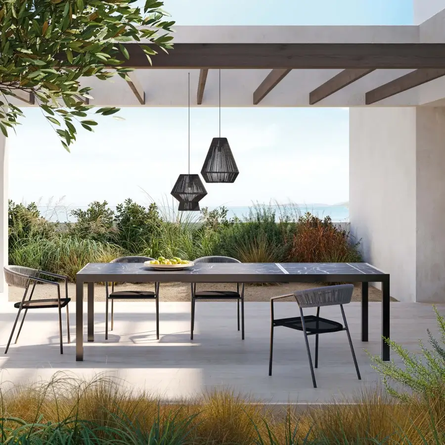 Exceptional MY YOUR Maja table crafted with dark grey stone-like tabletop and sleek matte black metal frame