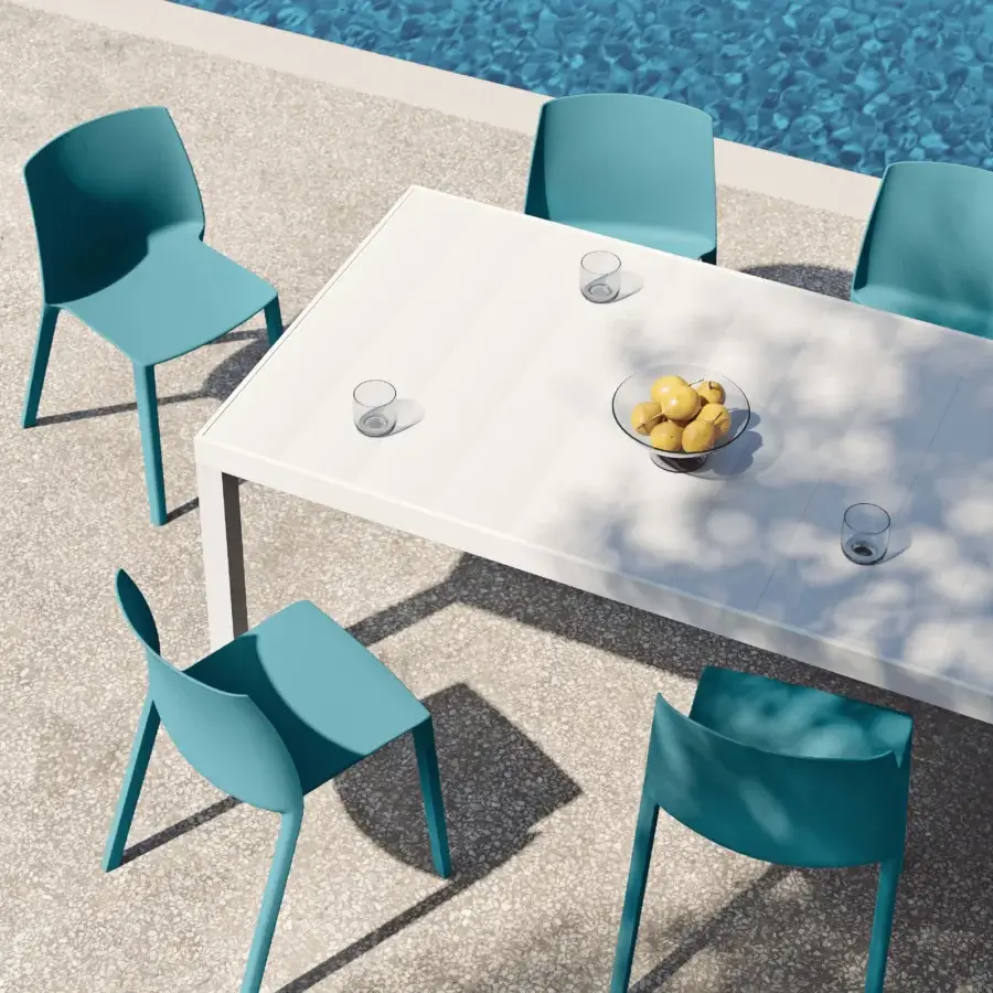Distinguished MY YOUR Maja table crafted with a smooth matte finish in a neutral off-white synthetic material and clean geometric lines