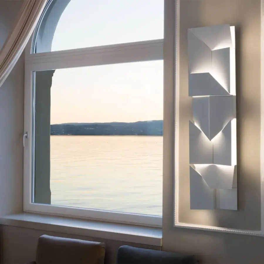 Exclusive Nemo Lighting Wall Shadows wall lamp crafted with laser-cut aluminum and matte white painted surfaces