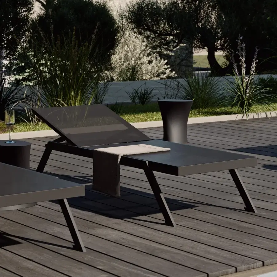 Exceptional MY YOUR Maja lounger built with a dark gray matte aluminum frame and a neutral supportive cushion