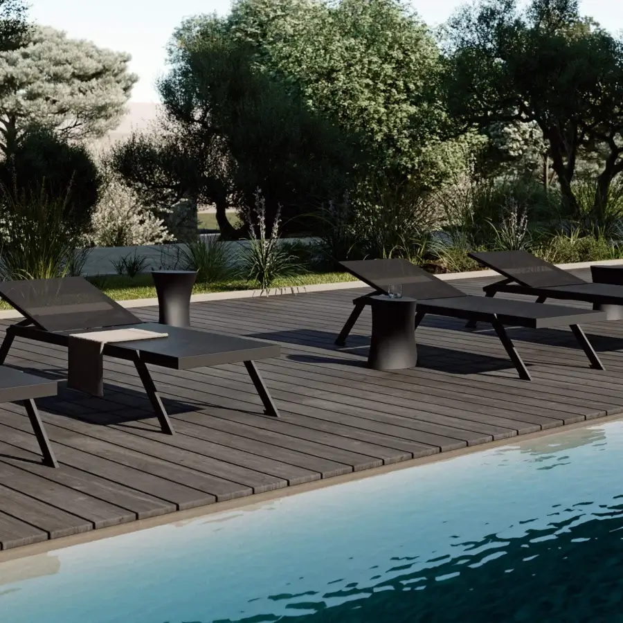 Refined MY YOUR Maja lounger built with a dark gray HPL surface and lightweight aluminum frame for comfortable resting