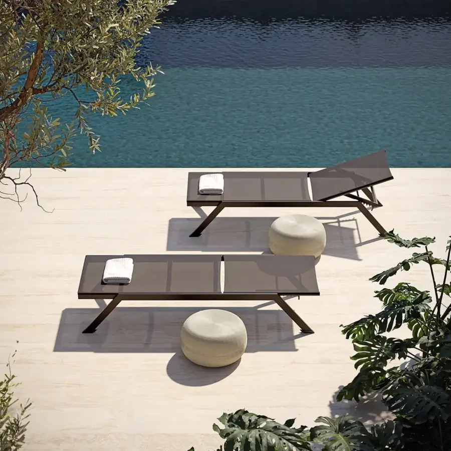 Superior MY YOUR Maja lounger built with a dark gray aluminum frame and lighter gray textured textile surface