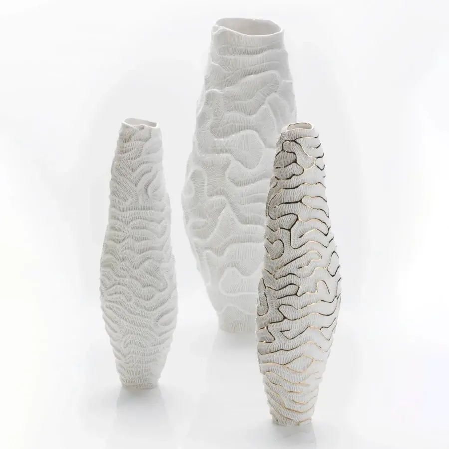 Elegant FOS Ceramiche Menhir vase crafted in white biscuit porcelain with dense organic texture