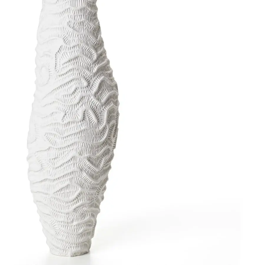 Exceptional FOS Ceramiche Menhir vase crafted in pure white biscuit porcelain with a vertically-ridged texture and ovoid silhouette