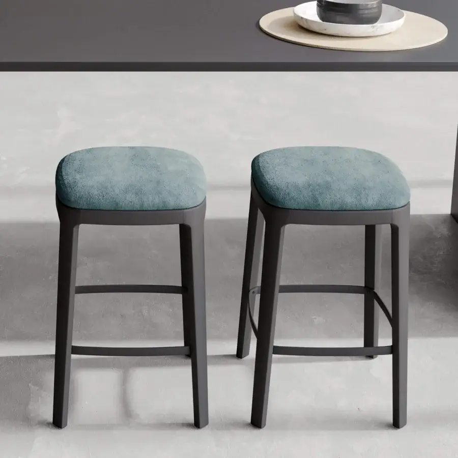 Distinguished Dallagnese Gulp stool with muted teal boucle upholstery and a matte dark-toned wooden structure