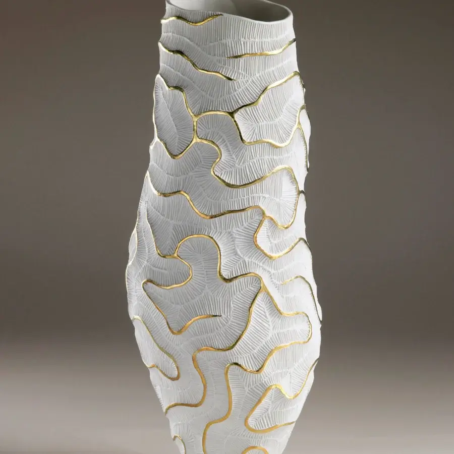 Distinctive FOS Ceramiche Monolite vase crafted in biscuit porcelain with inlaid 23K gold lines and a matte finish