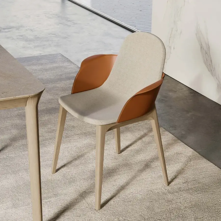 Distinguished Dallagnese Hull chair with a solid wood frame, neutral beige upholstery and reddish-brown leather shell in satin finish