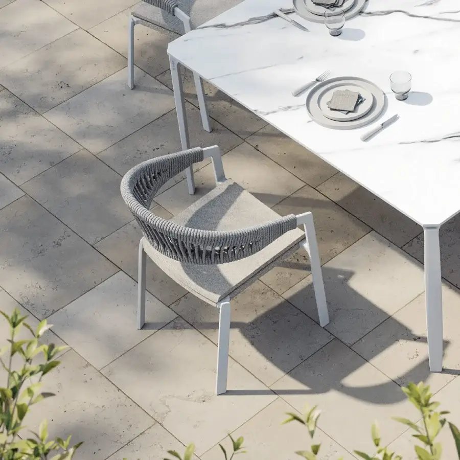 Elegant MY YOUR Italian Outdoor Experience armchair with woven grey textile and white powder-coated aluminum frame
