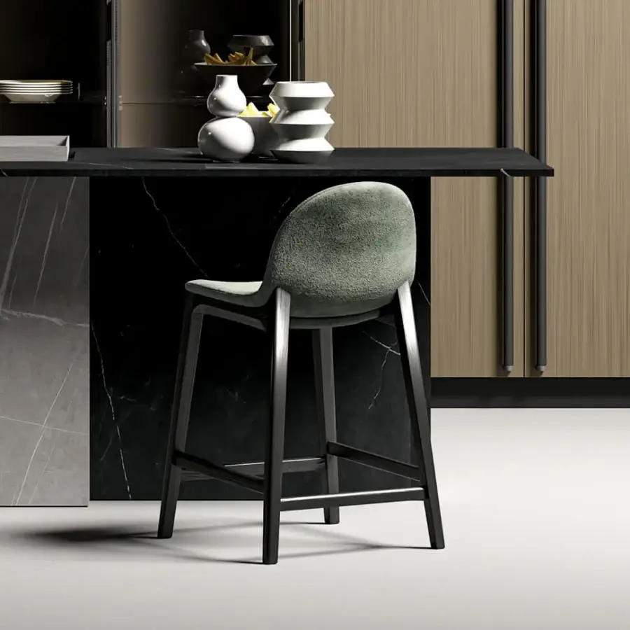 Elegant Dallagnese Hull stool with textured grayish-green textile upholstery and matte black metal frame