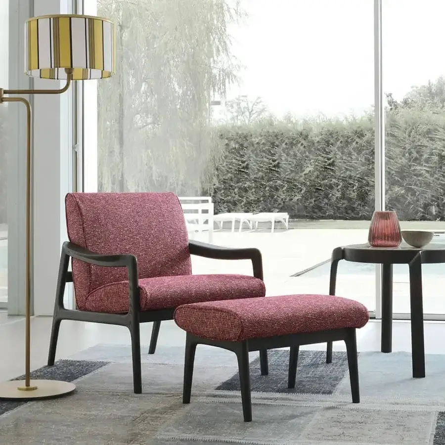 Luxury CTS Salotti Jack lounge chair with reddish-pink textured fabric and a satin Canaletto walnut frame