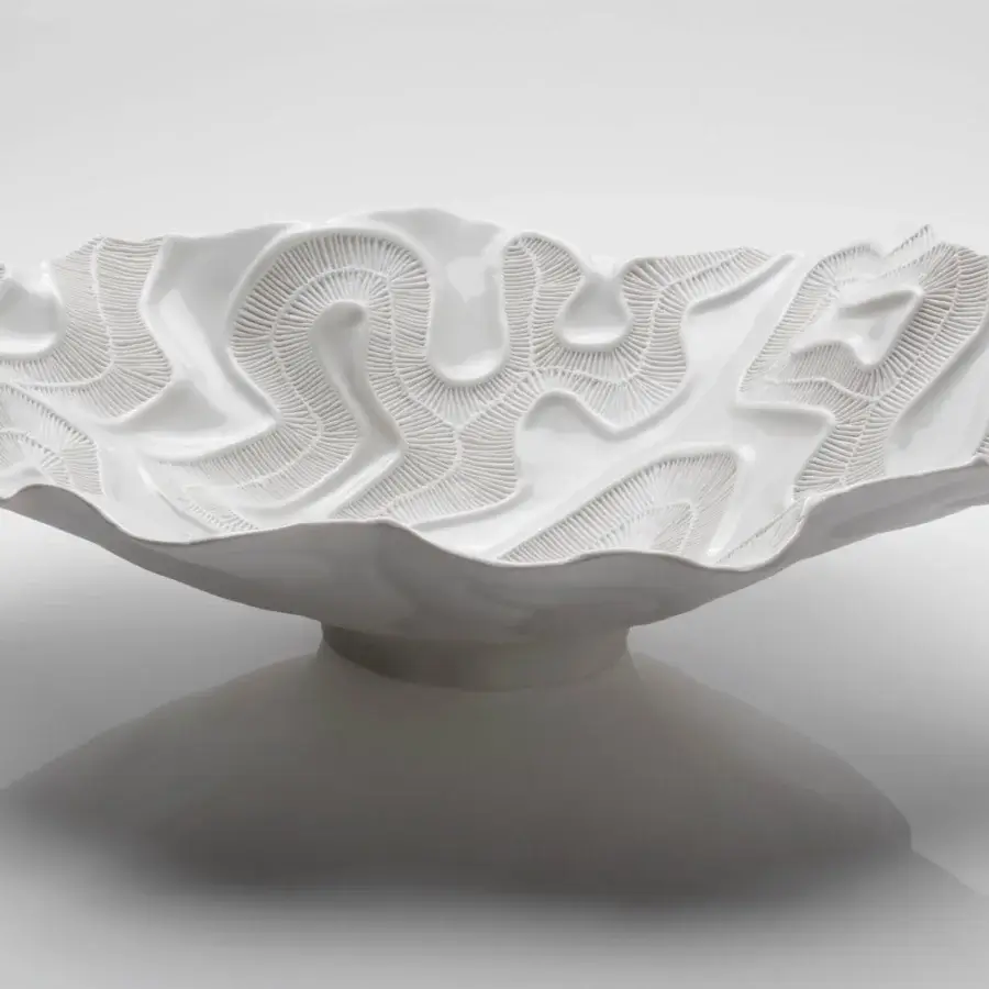 Superior FOS Ceramiche Opensea centerpiece crafted in bright white biscuit porcelain with swirling, wave-like textured surface and tiered pedestal