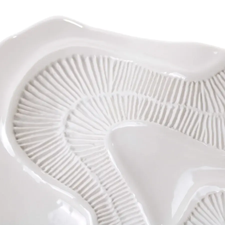 Distinguished FOS Ceramiche Opensea centerpiece crafted in white biscuit porcelain with a matte, subtly undulating surface