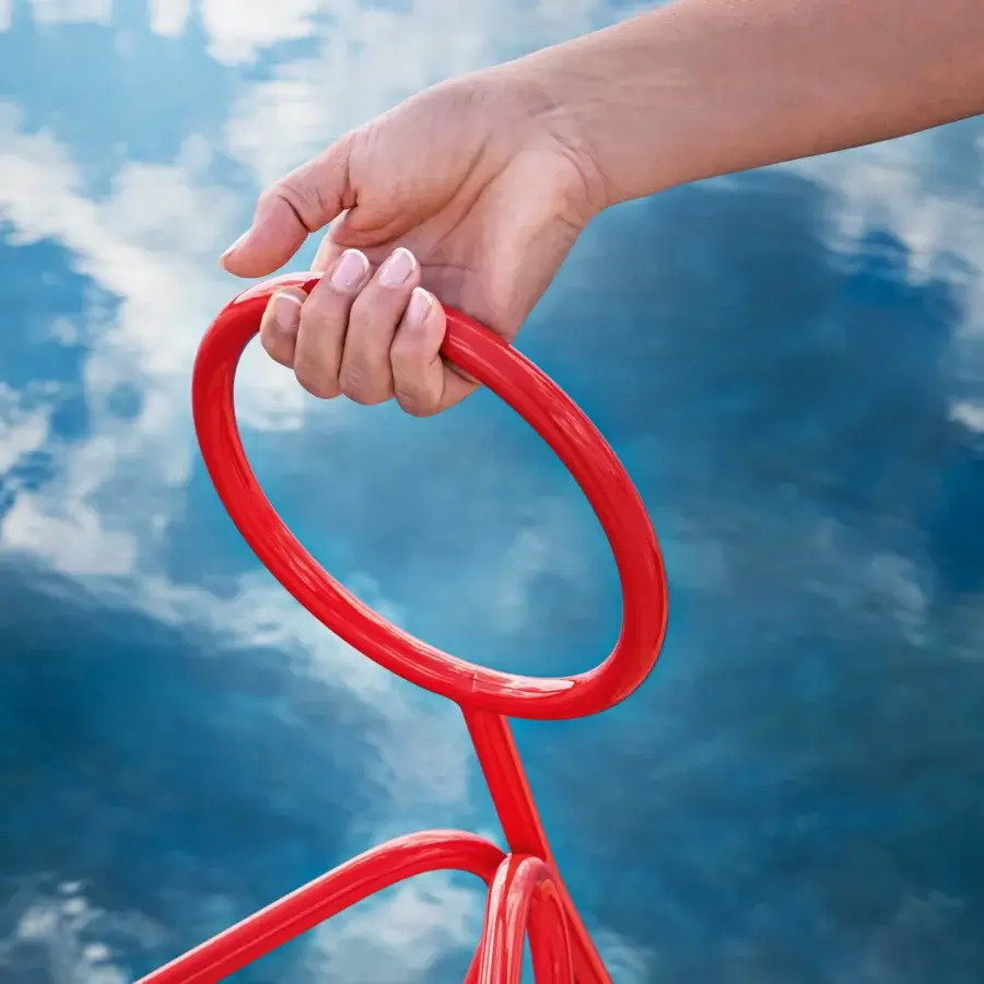 Avant-garde MY YOUR Steward multi-purpose stand crafted with curved metal in glossy red finish