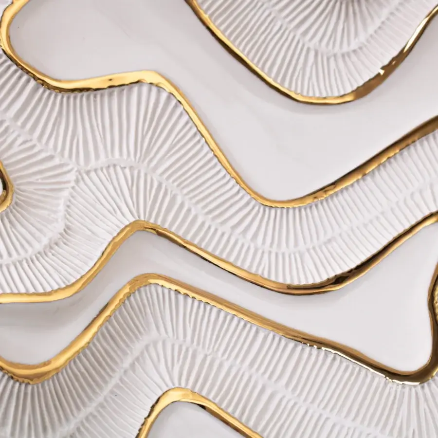 Exceptional FOS Ceramiche Opensea centerpiece crafted from biscuit porcelain with 23K gold lines and matte finish