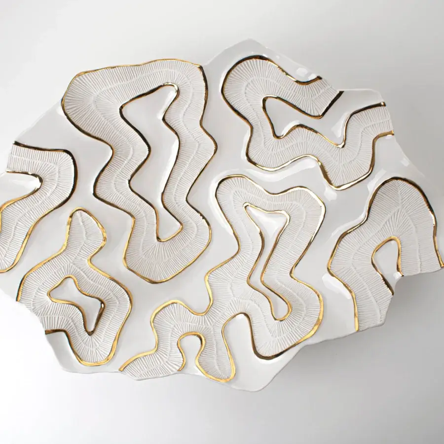 Distinguished FOS Ceramiche Opensea centerpiece crafted from biscuit porcelain with hand-applied 23K gold and glossy white finish